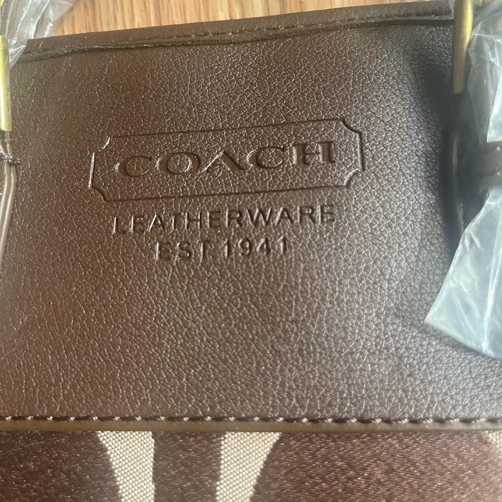 Coach Signature Hand Bag Brown in Color